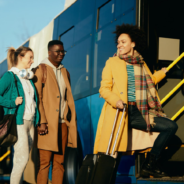 Students getting on Motorcoach